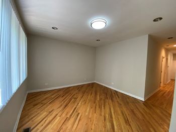 Hardwood flooring throughout